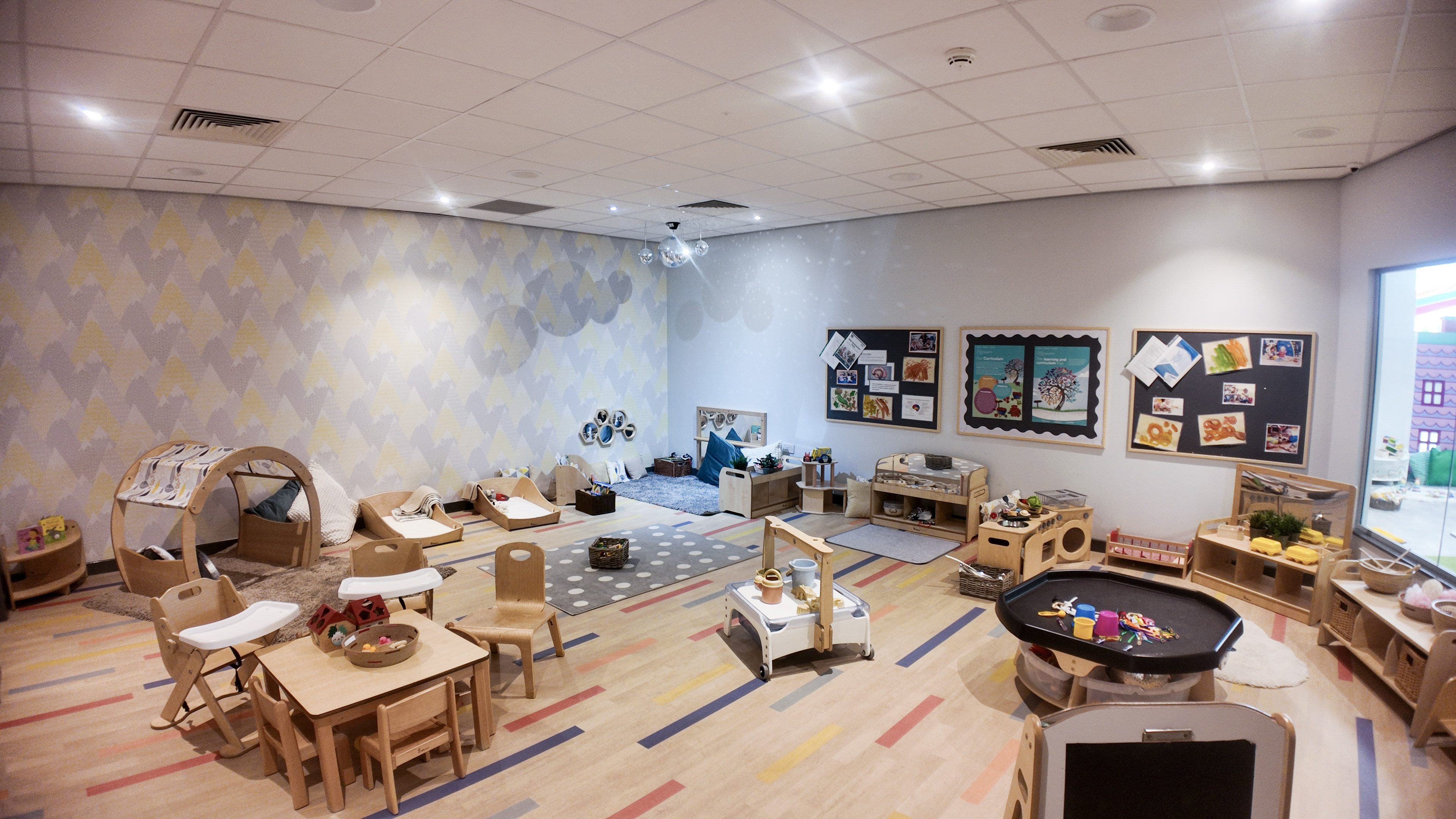 Sensory tuff tray and cosy nook in the baby room